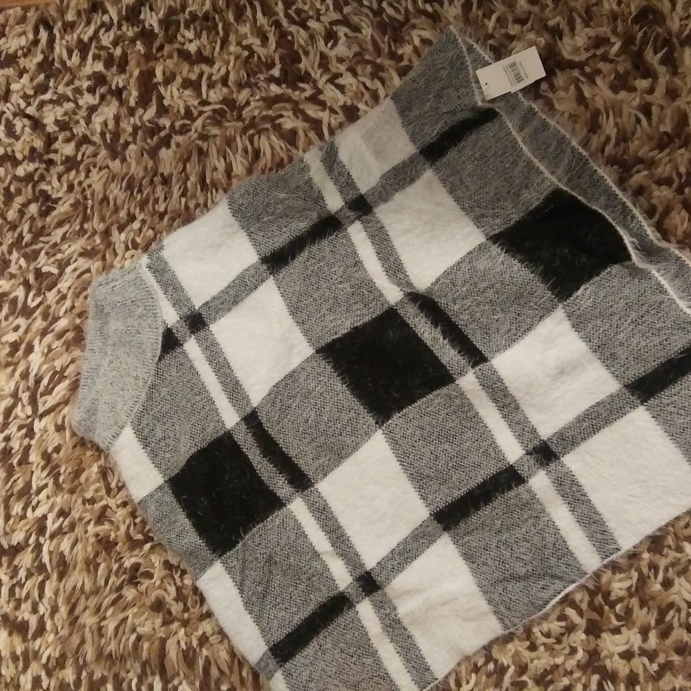 Catherine Lillywhite's plaid poncho